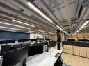 Office with commercial lighting.