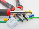 pliers and a screwdrivers on a table 