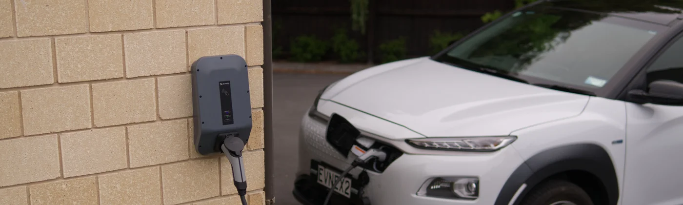 car charging next to wall 