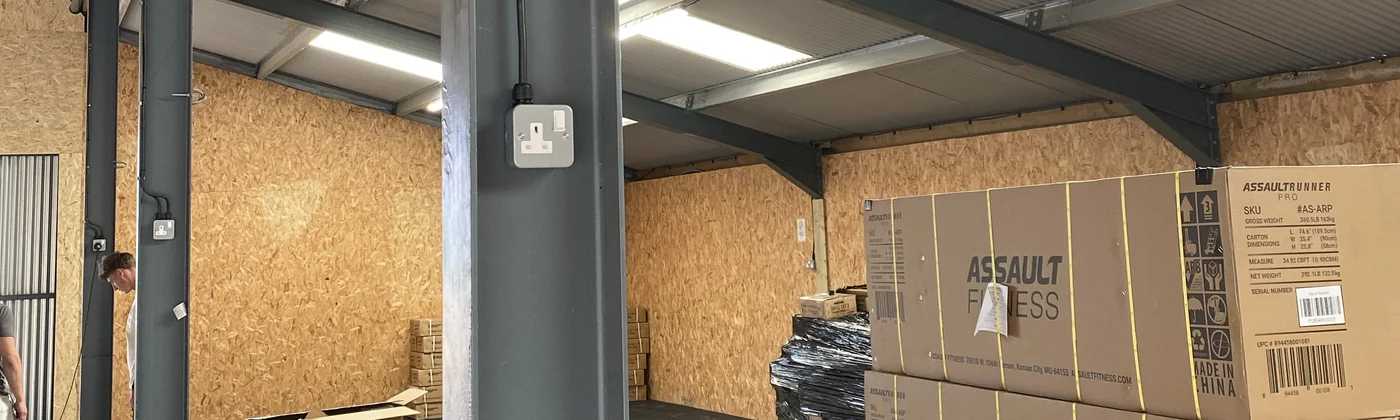 warehouse with boxes and a plug