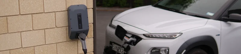 car charging next to wall 