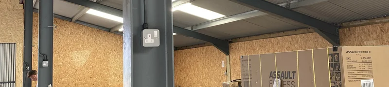 warehouse with boxes and a plug
